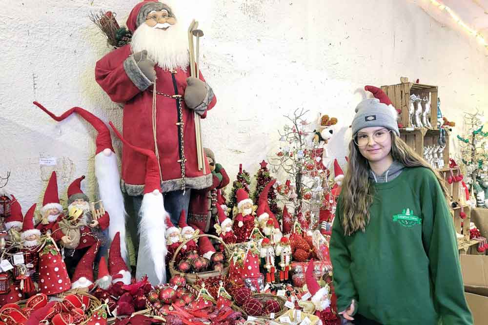 Anais Hendy, Shop Manager at the Crafts at Christmas shop with some of the decorations that will be on trend this year.