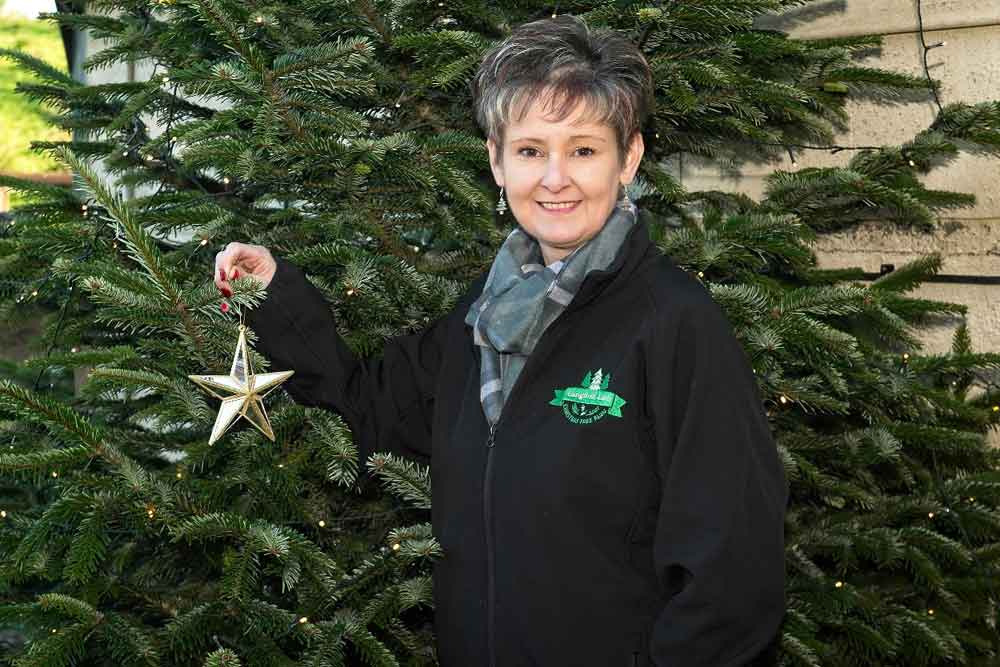Trudy Hendy with a Christmas tree decoration